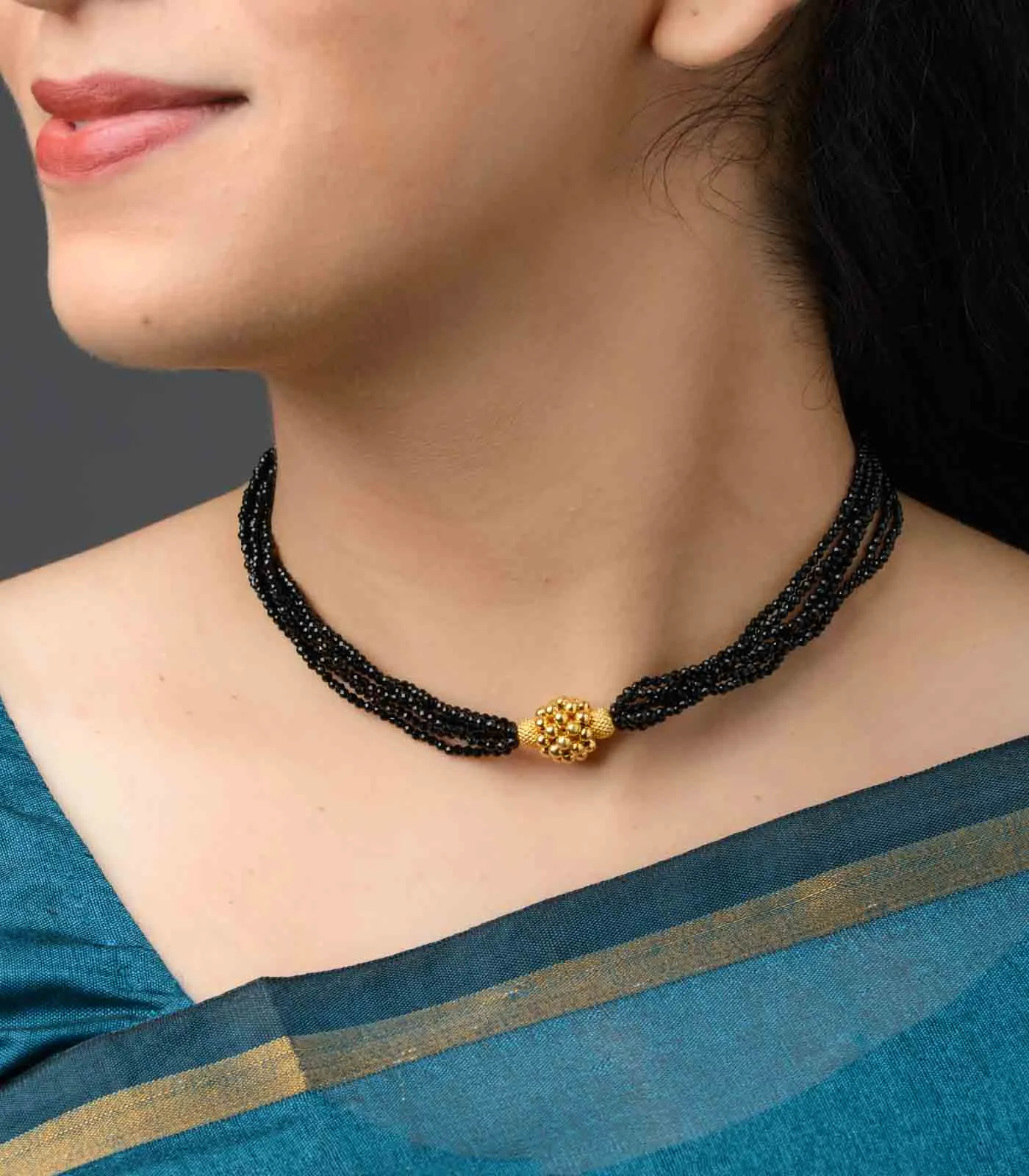 Black Beads Radiant Gold Pendant Necklace