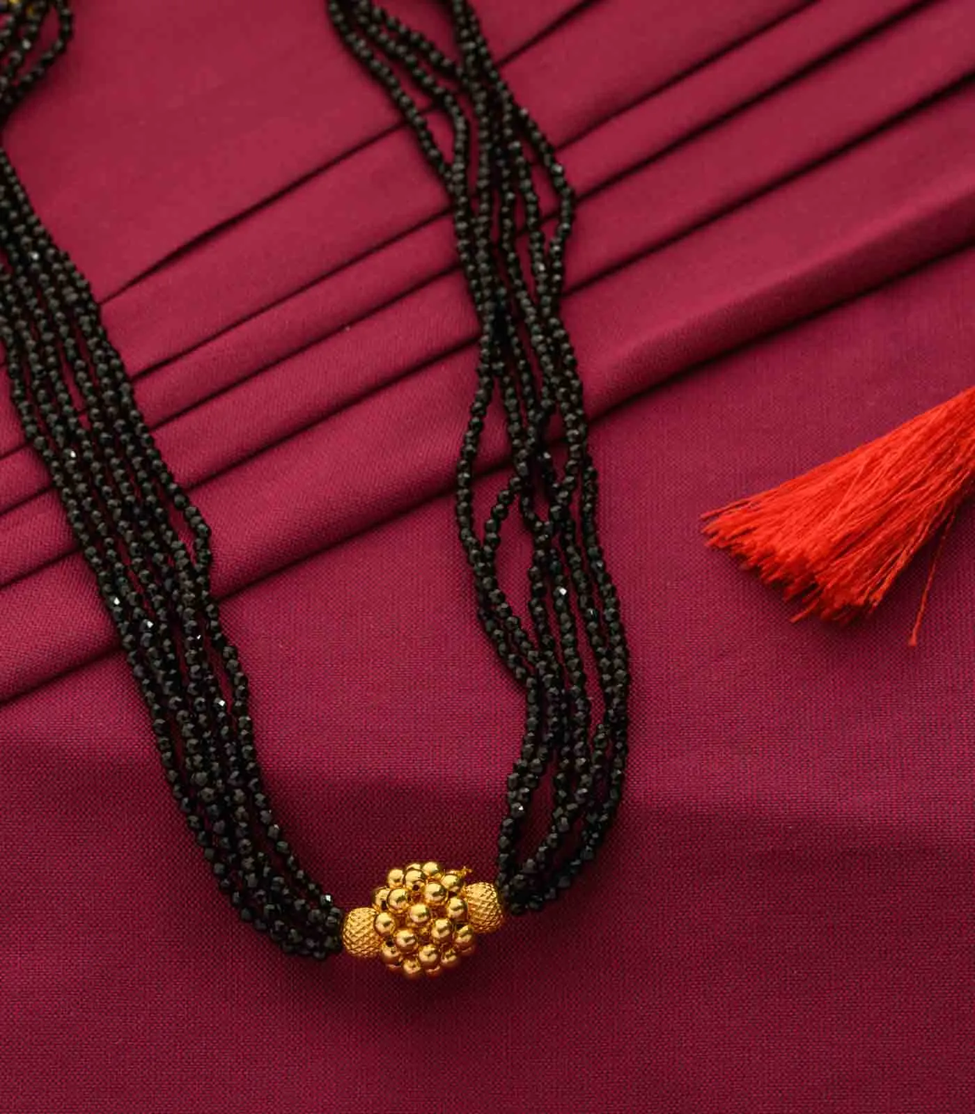 Black Beads Radiant Gold Pendant Necklace